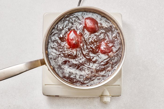 Beets boiling in a saucepan