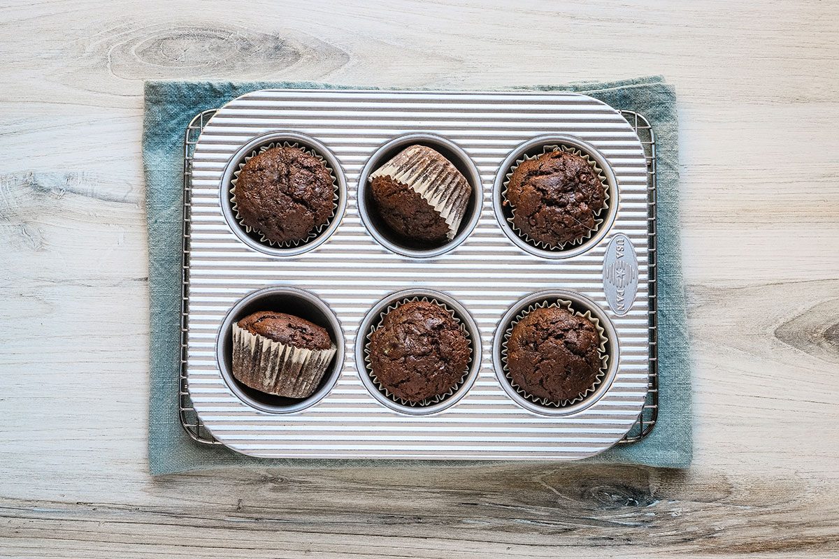 Baked homemade chocolate zucchini muffins fresh from the oven.