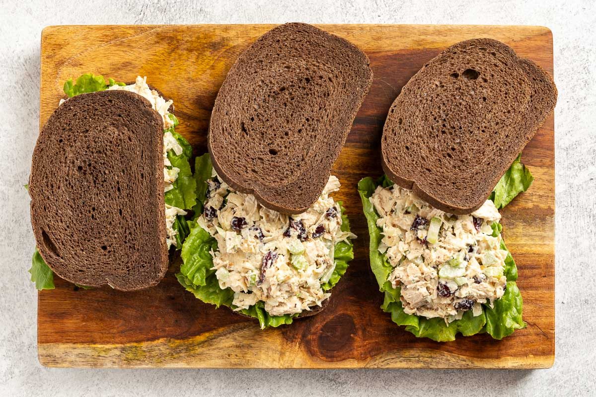assembling Cranberry Chicken Salad on bread