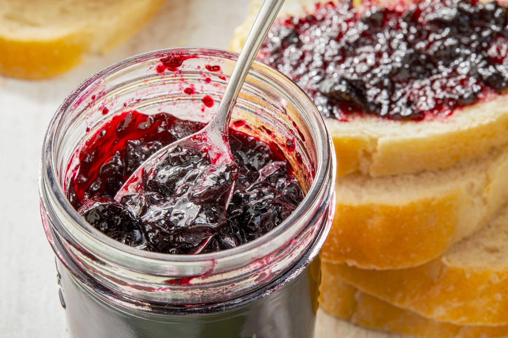 3/4th shot of elderberry jelly in a jar