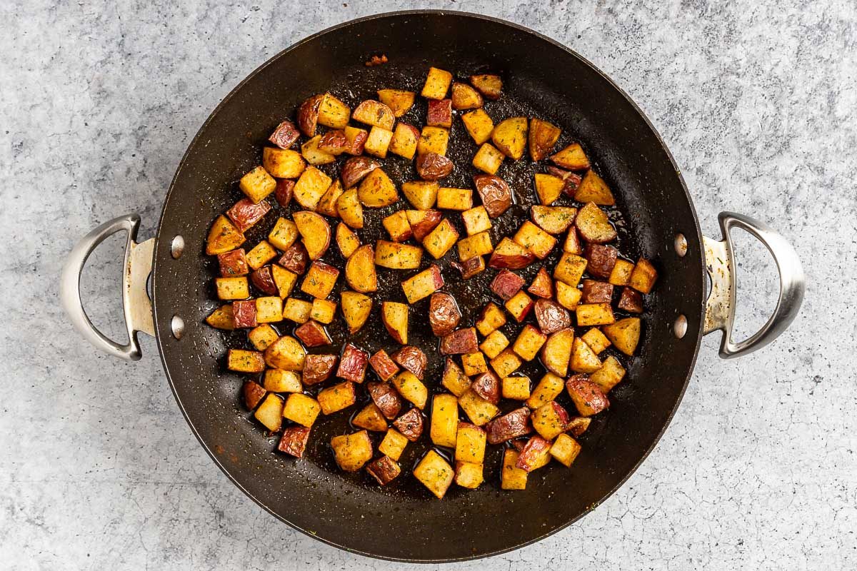 Taste of Home Fried Red Potatoes photo of the seasoned fried potatoes.