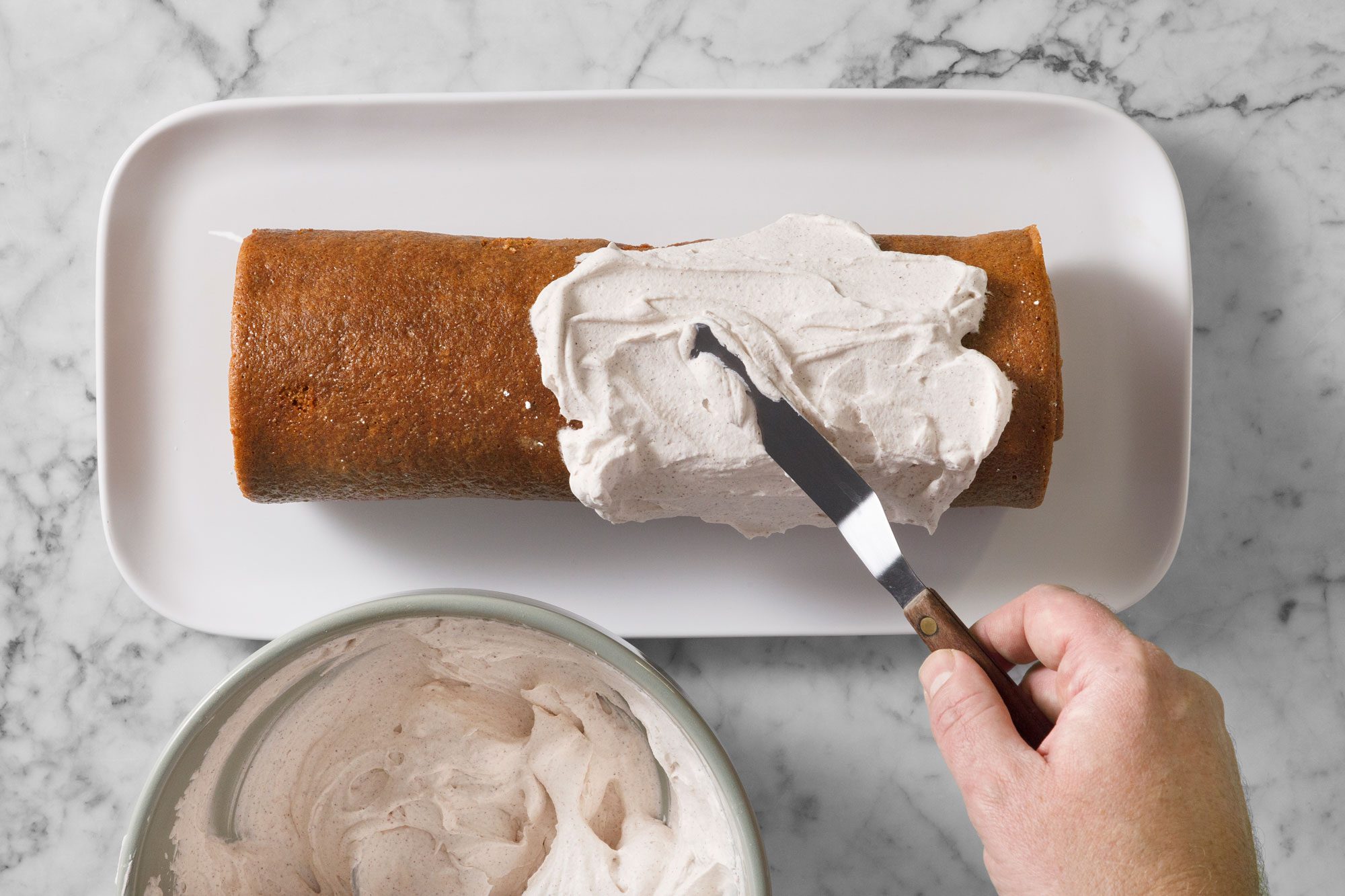 Spread remaining filling over cake