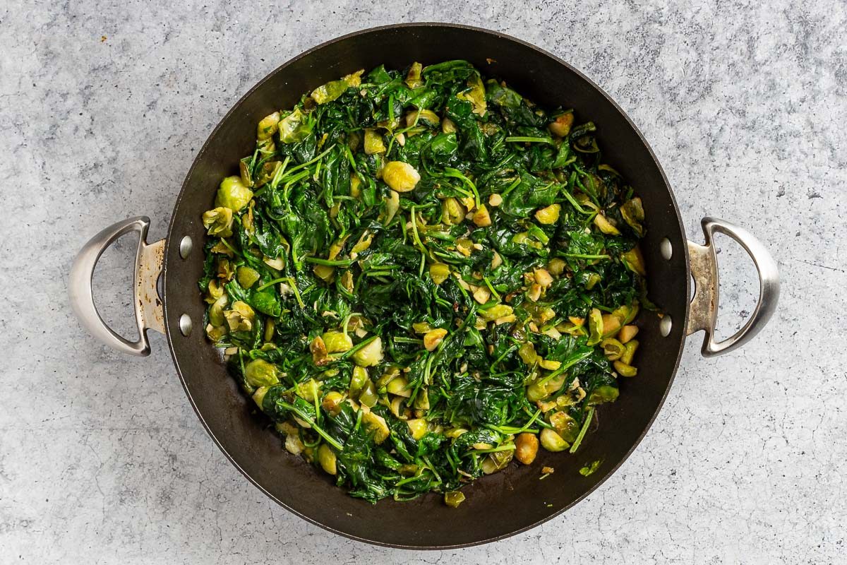 cooking greens in skillet