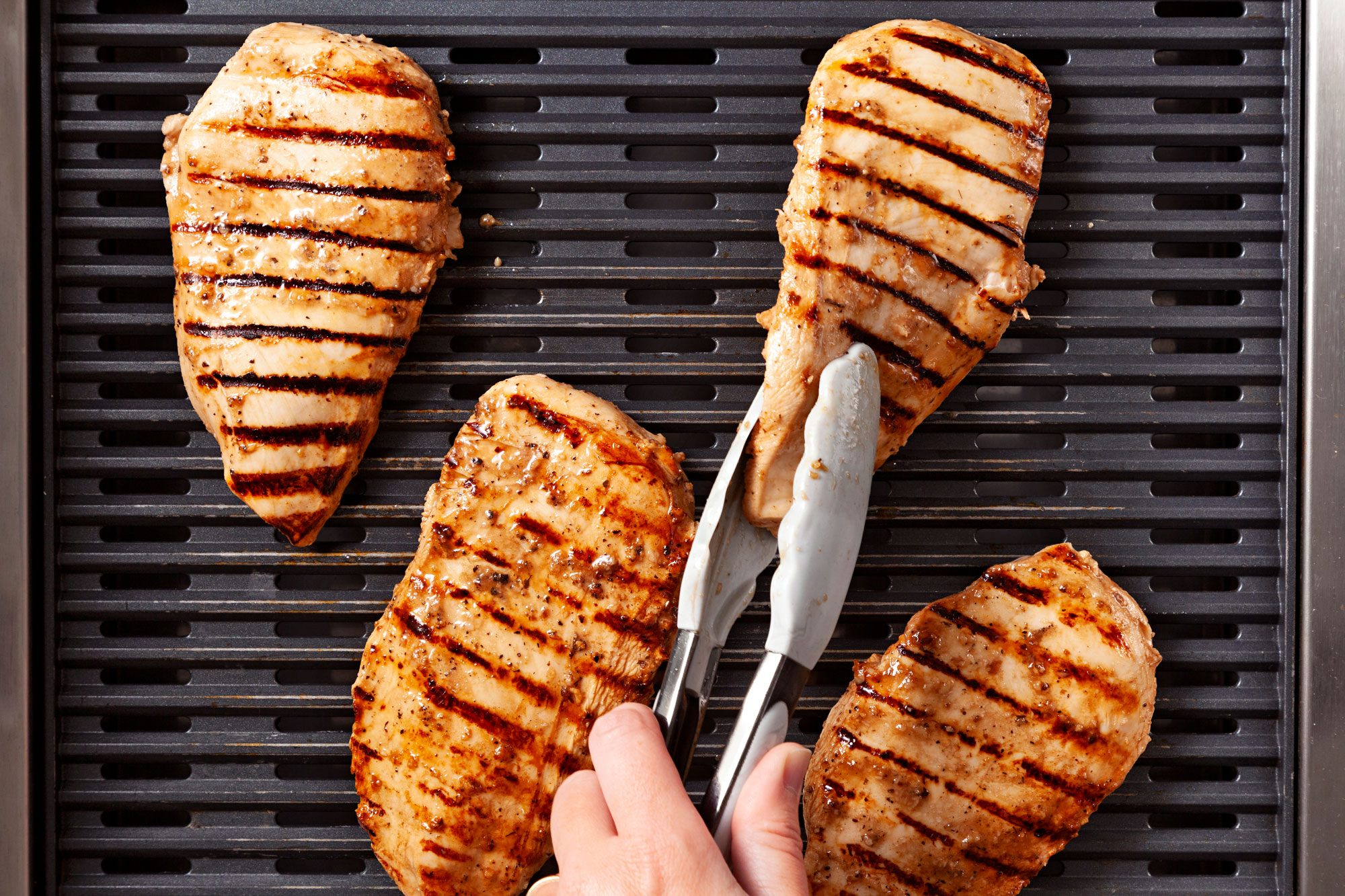 On a lightly greased grill rack, grill chicken, covered, for 4-5 minutes on each side