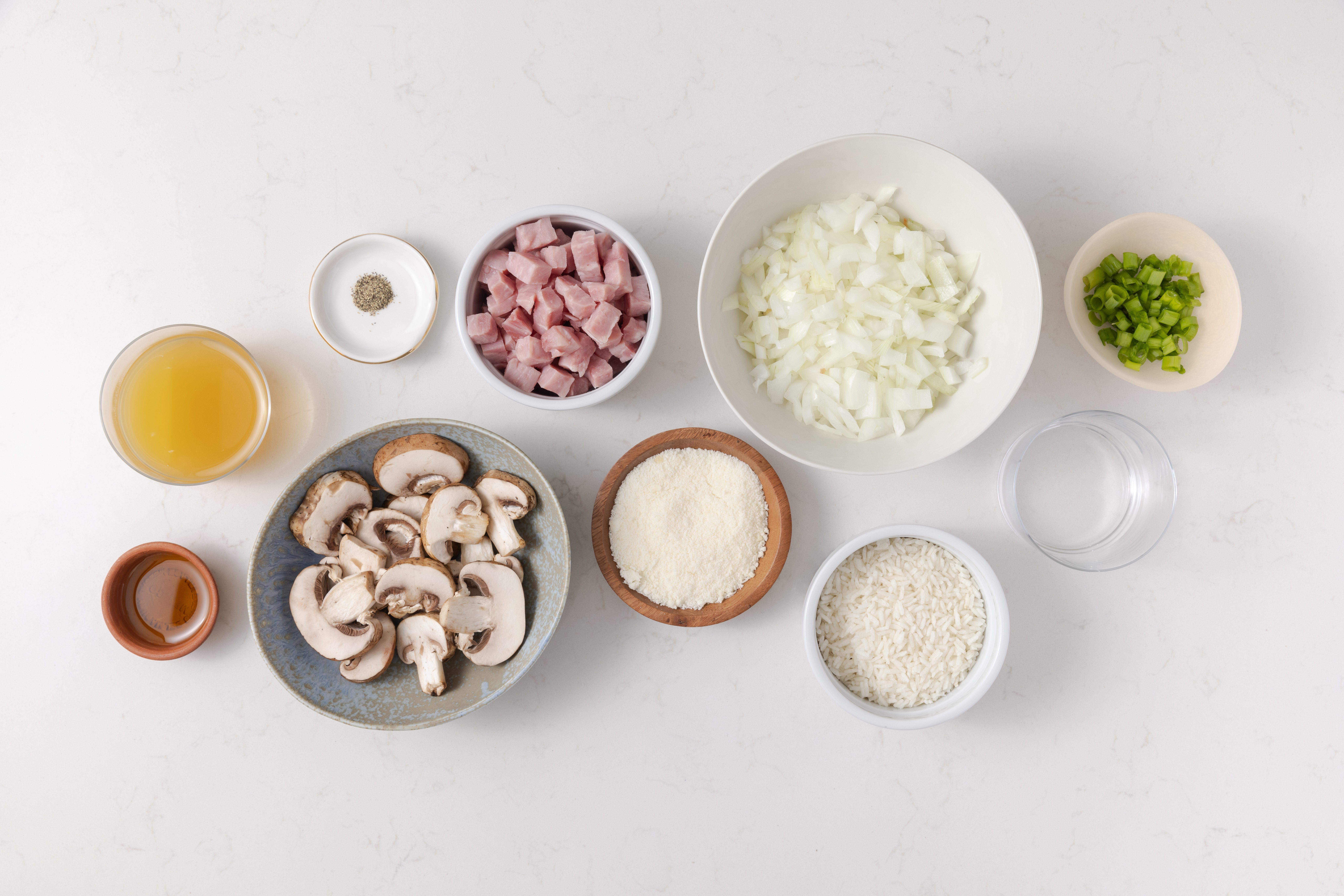 Ingredients for ham and rice on kitchen counter.