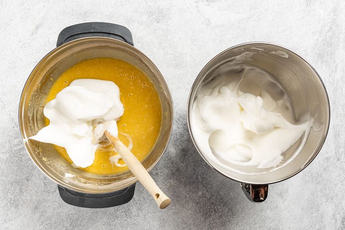 folding whipped egg whites into the batter.