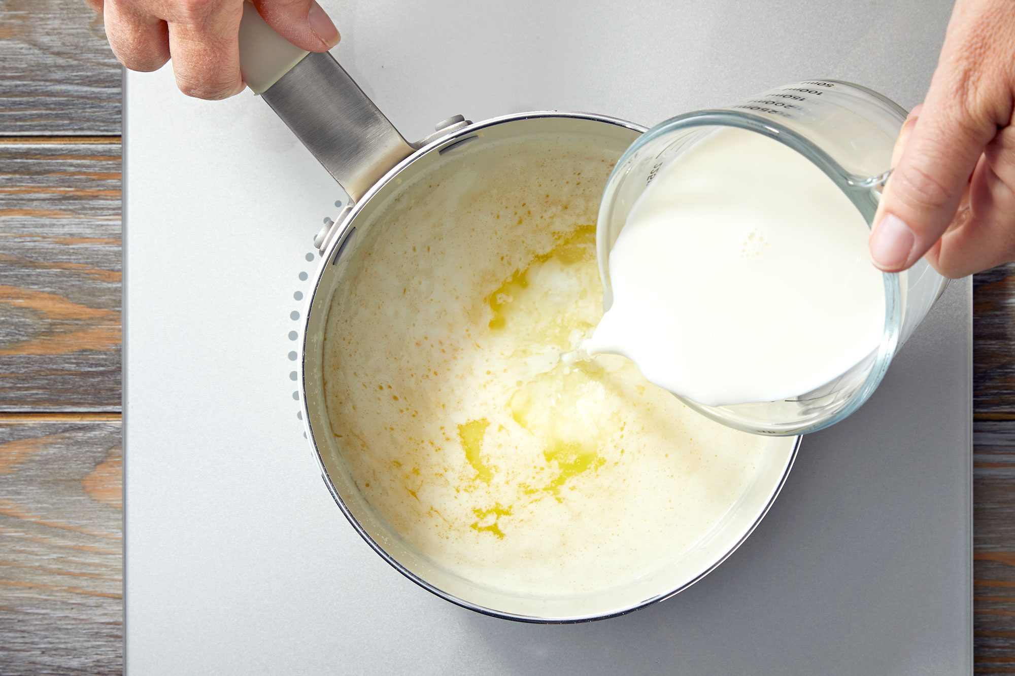 add milk; Heat until bubbles appear around the edge of the pan; keep warm