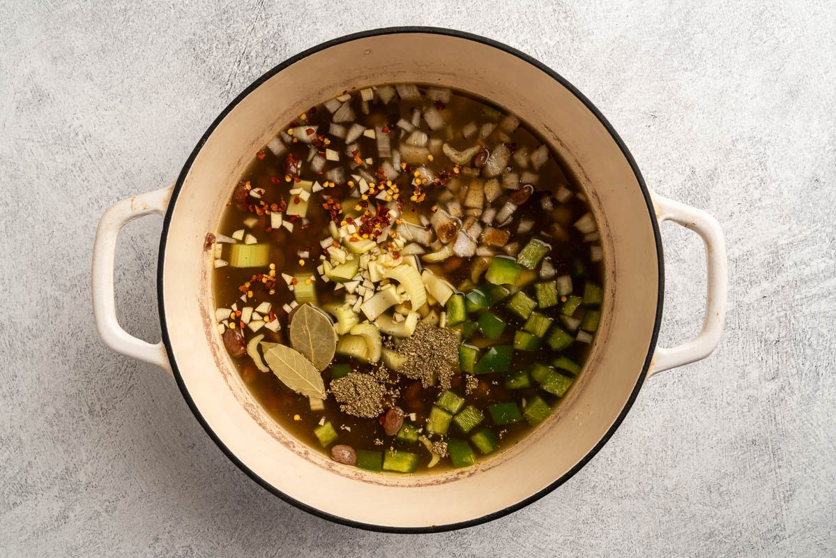 drained beans with the remaining ingredients except the tomatoes.