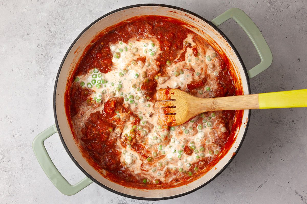 Step 4 of Taste of Home Pasta with Sausage & Peas is to add the cream and peas