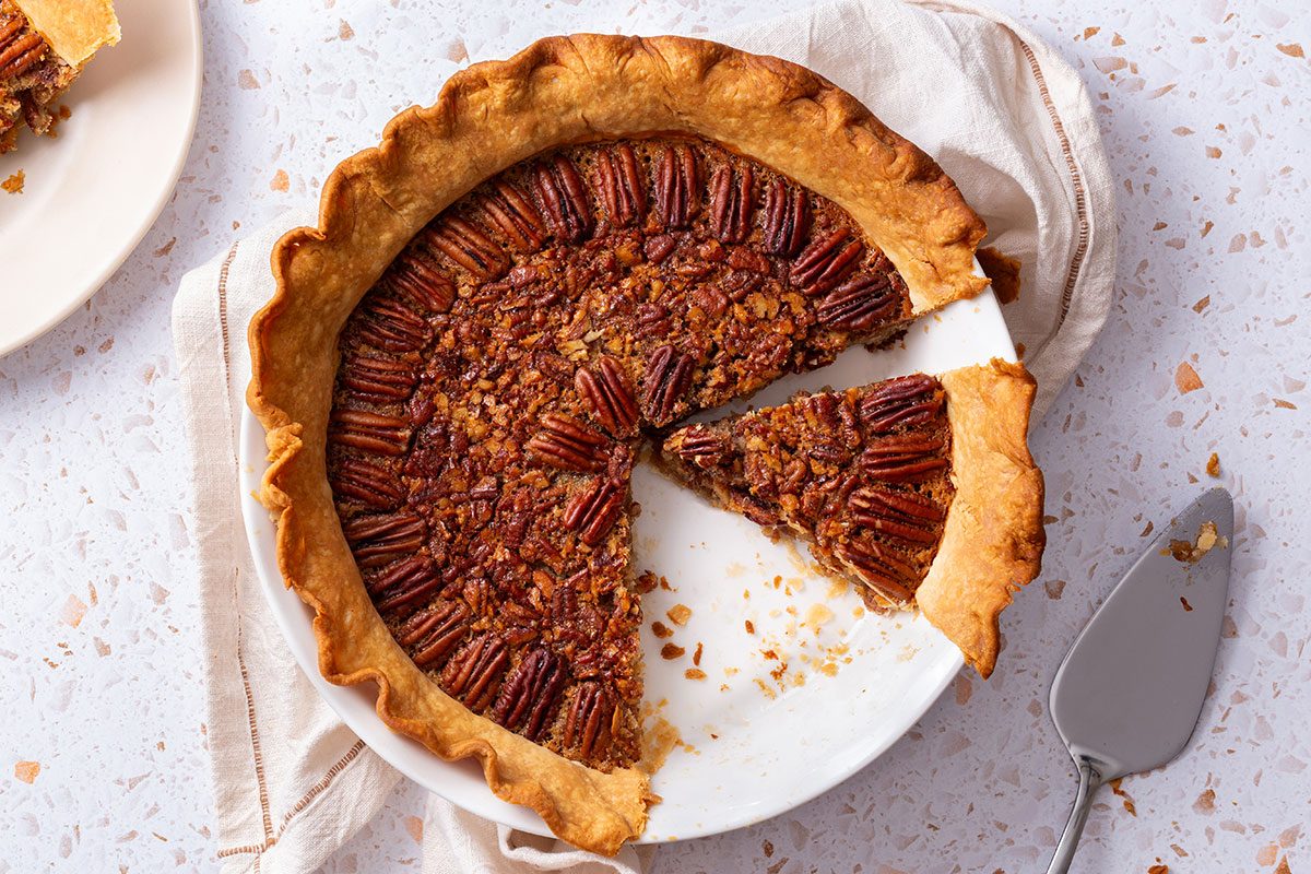 Overhead shot of a sliced Pecan Pie for Taste of Home