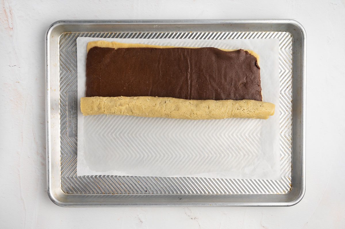 rolling up dough for Pinwheel Cookies