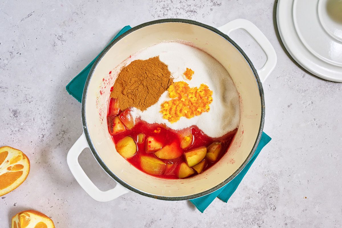 ingredients in pot while making plum jam