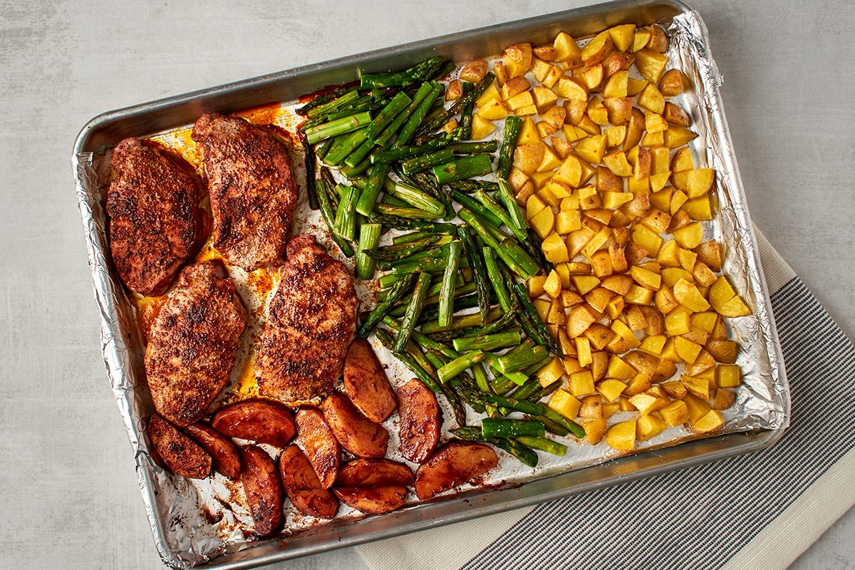 This pork chop and asparagus recipe by Taste of Home is a complete dinner cooked on a single sheet pan.