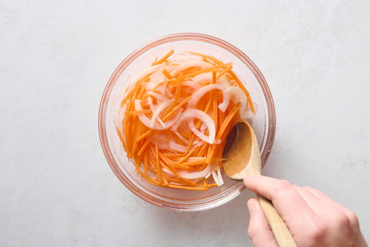 Pickling the carrots and onions