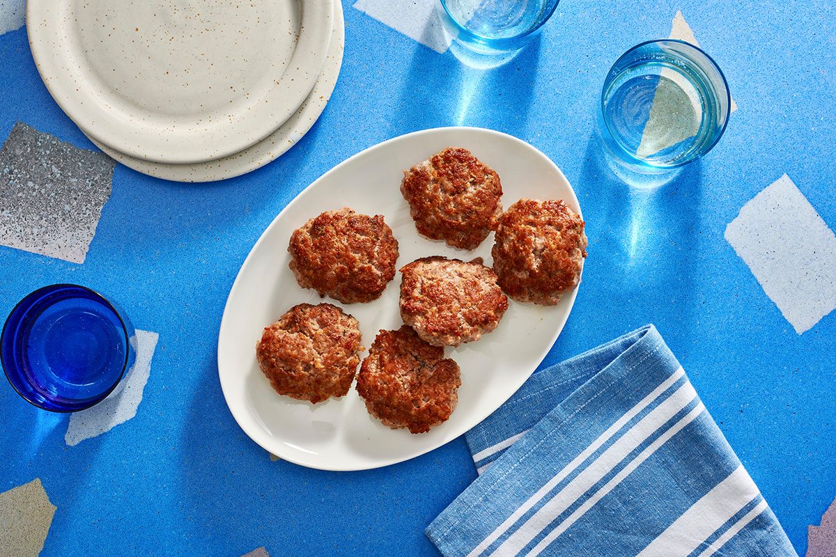 Cooked pork patties arranged on a plate