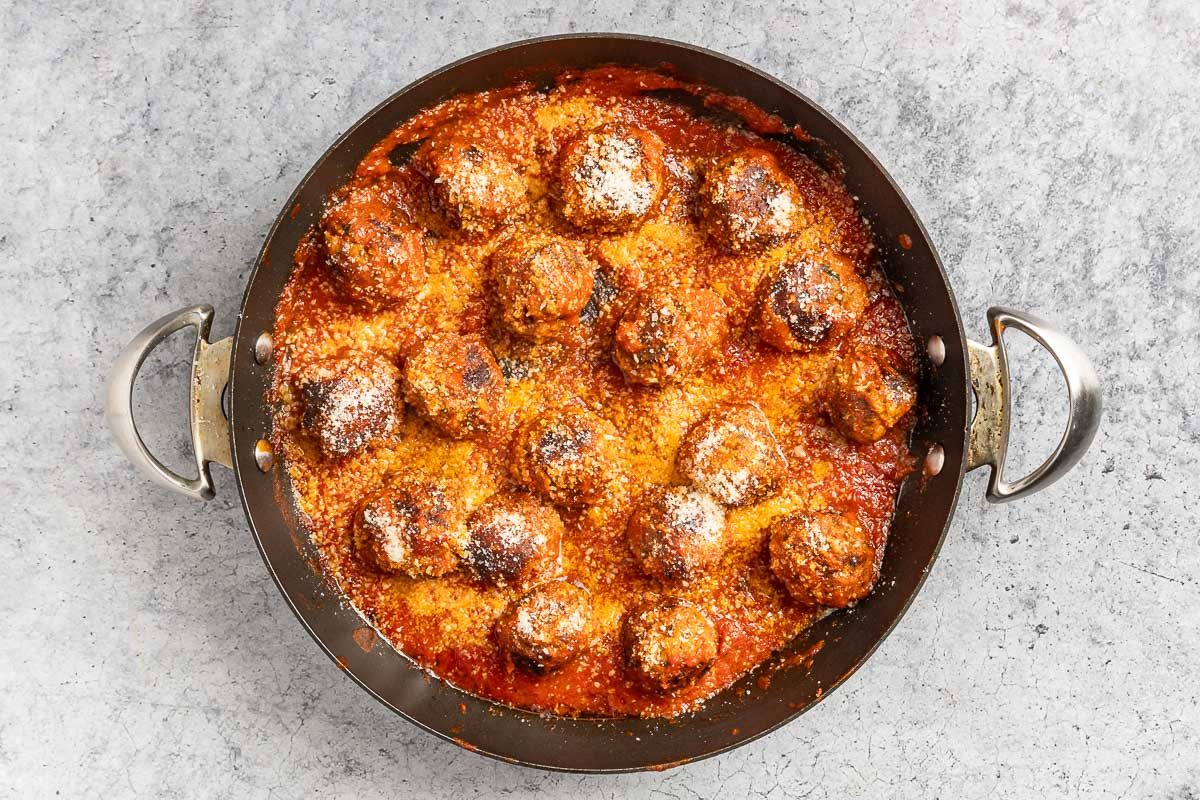 Taste of Home Ricotta Meatballs photo of the meatballs simmering in the sauce.