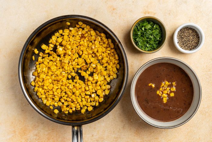 cooked corn to be used as a garnish.