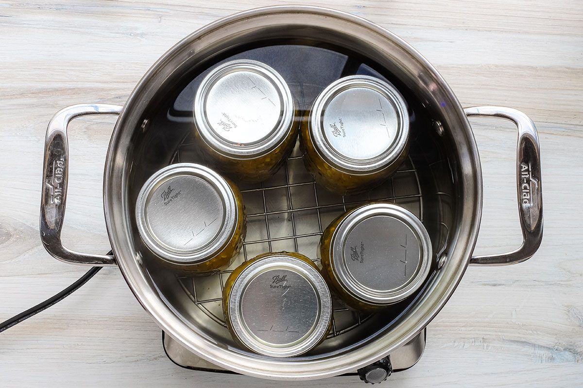 Canning pot with jars of squash relish.