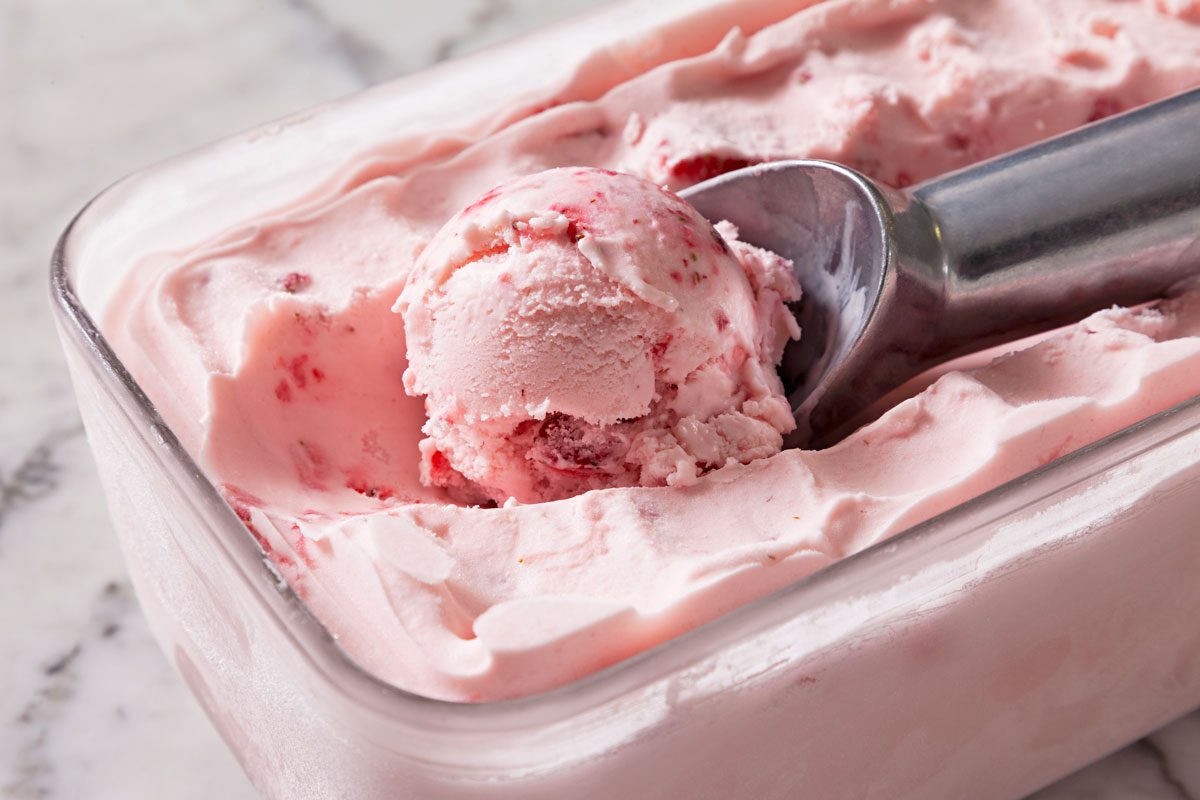 close up texture Of Strawberry Ice Cream being scooped