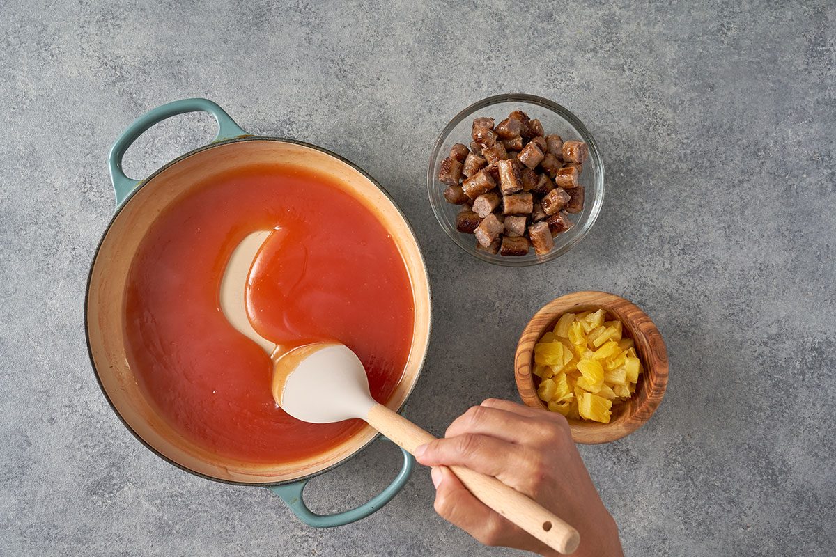 Combine sugar, cornstarch, water, vinegar, and ketchup in a bowl, then stir it into the skillet. Add the pineapple and sausage, and heat through before serving over rice for this Sweet-and-Sour Sausage by Taste of Home.