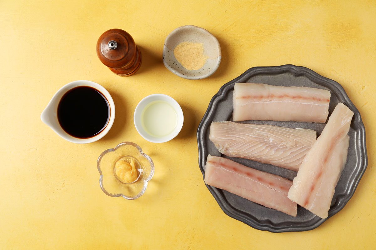Ingredients for Taste of Home's Teriyaki Mahi Mahi laid out in small bowls on bright yellow surface.