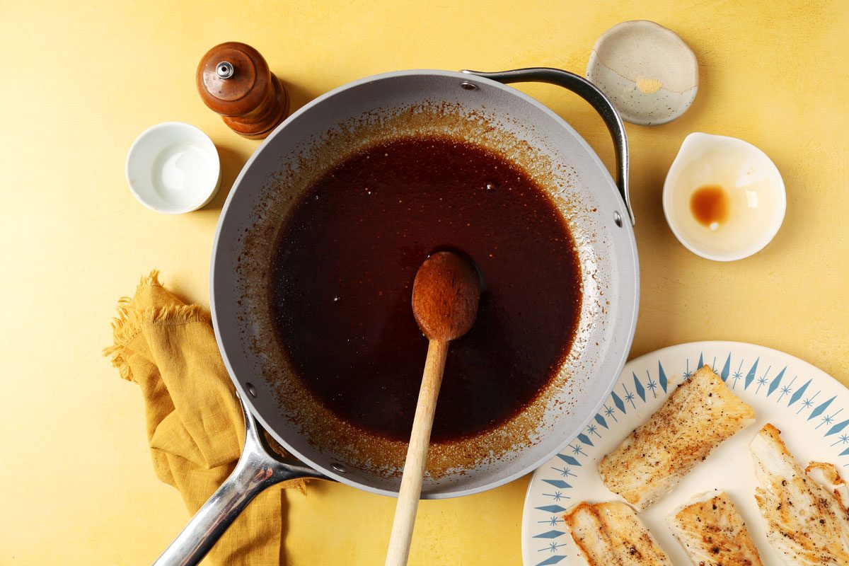 Process of making Taste of Home's Teriyaki Mahi Mahi laid out in small bowls on bright yellow surface.