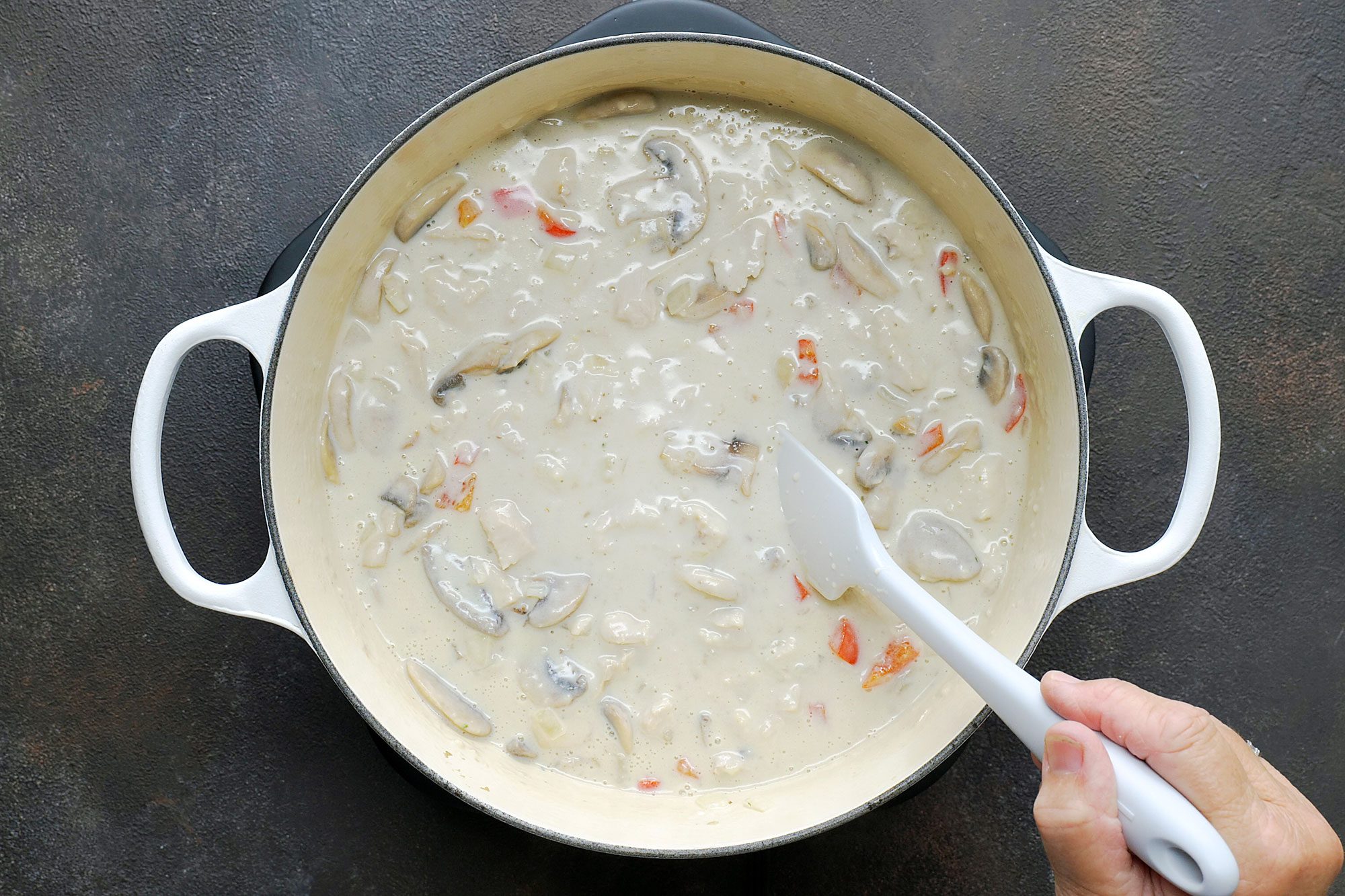 Stir in turkey and cheese; heat through.