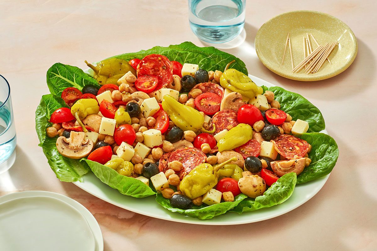 Antipasto mixture served on a lettuce-lined platte