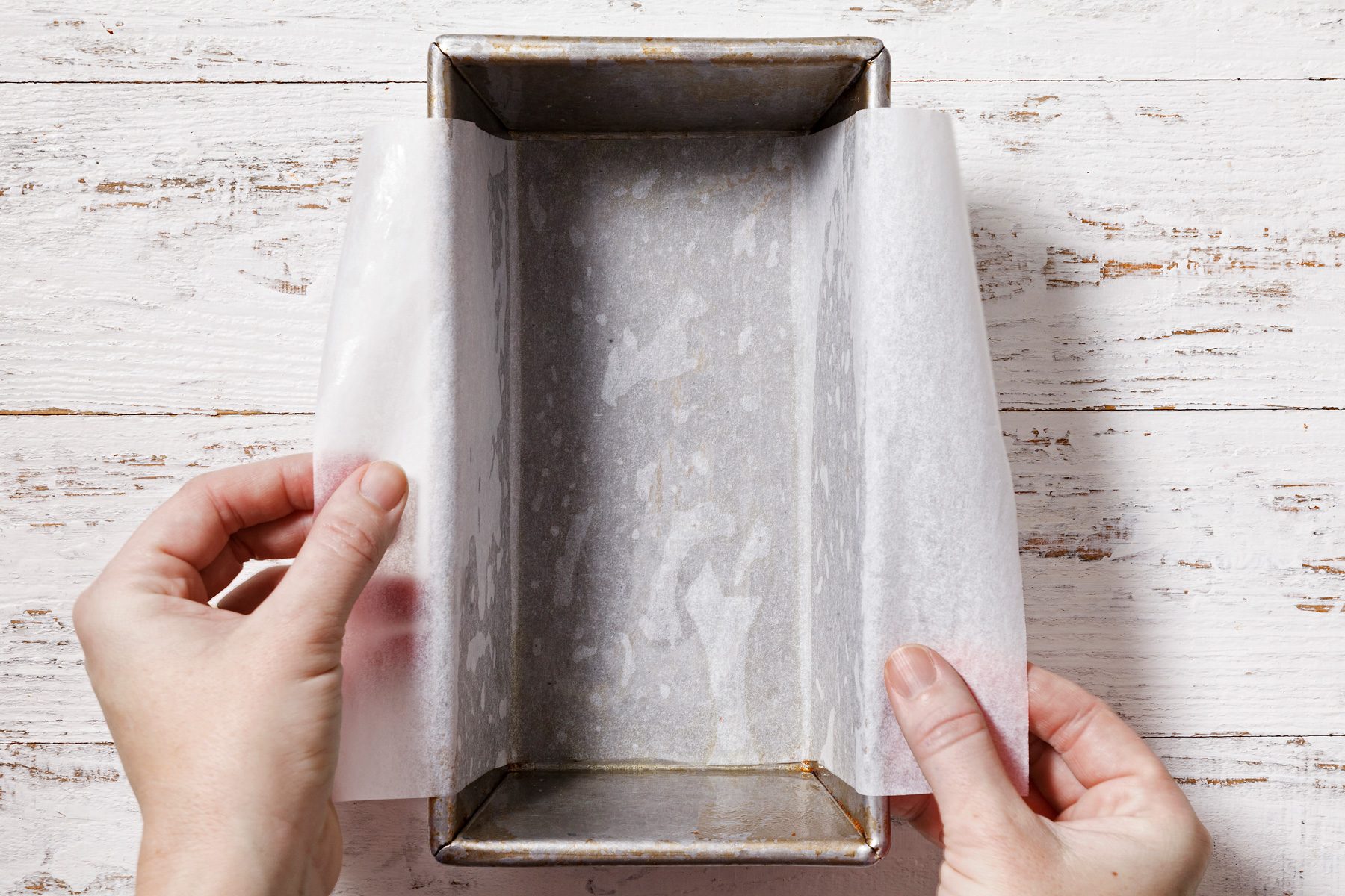 Grease a loaf pan, line with parchment, letting ends extend over sides.