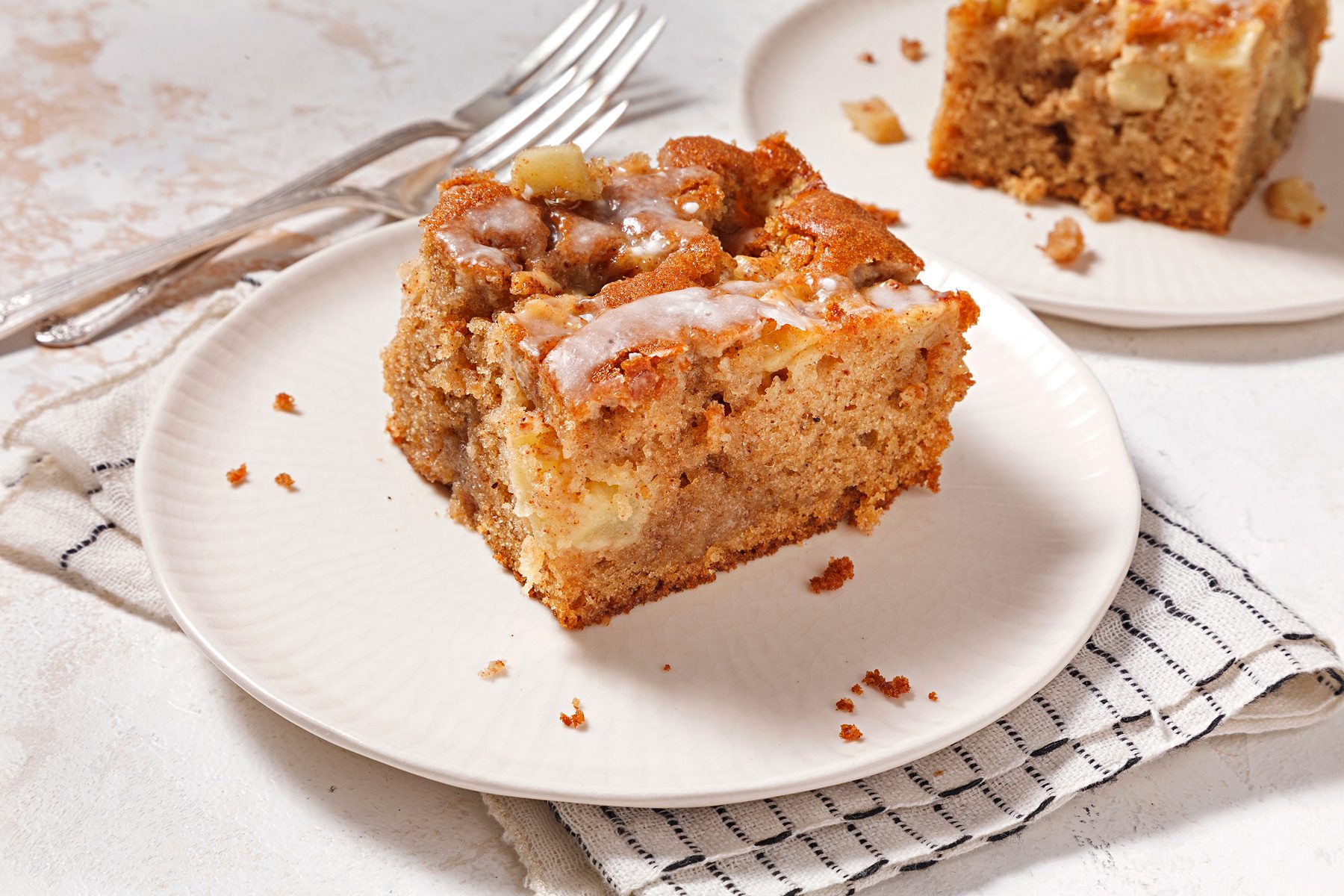 3/4th shot of glazed apple fritter cake slice