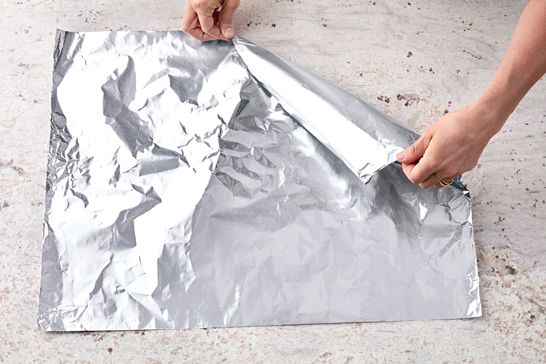 roll sheet of foil into a cone shape.