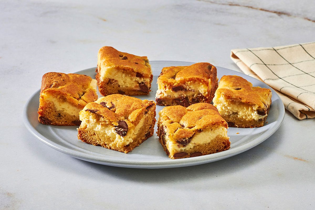 Chocolate chip chees bars served on a serving plate