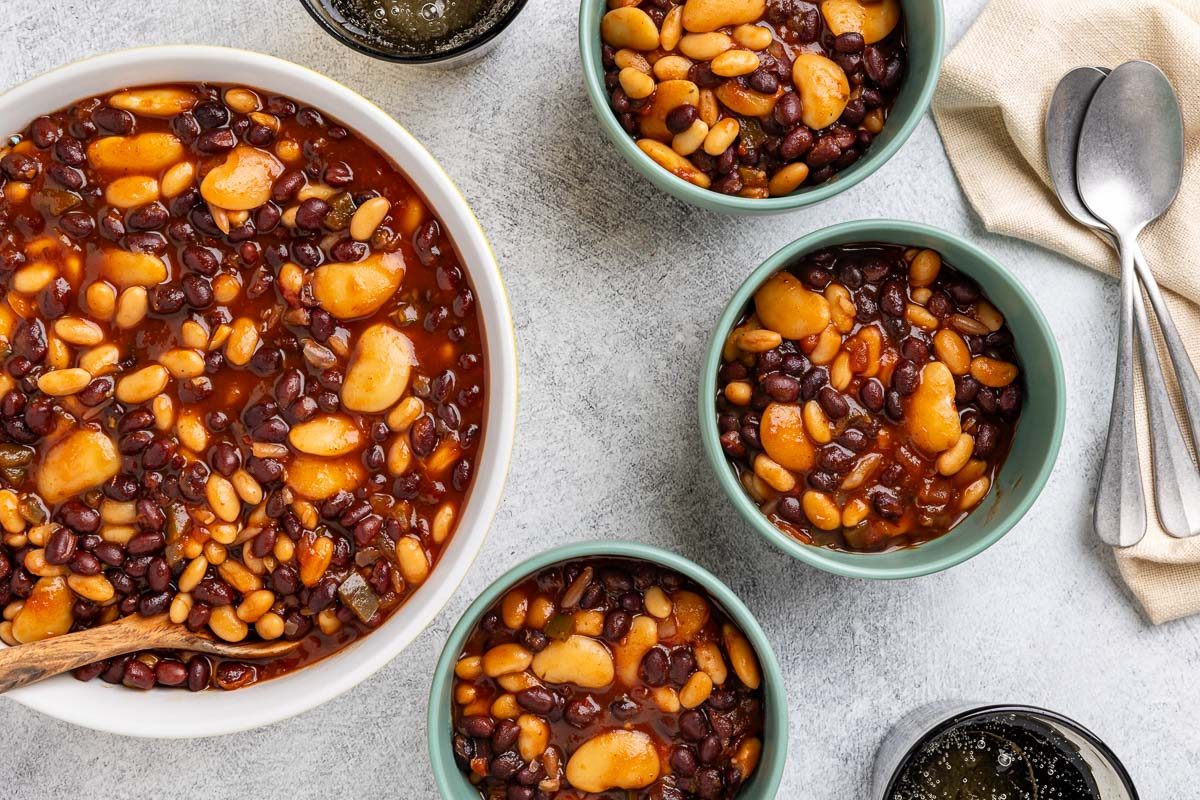 Taste of Home Crockpot Baked Beans recipe photo of the finished recipe portioned into bowls.