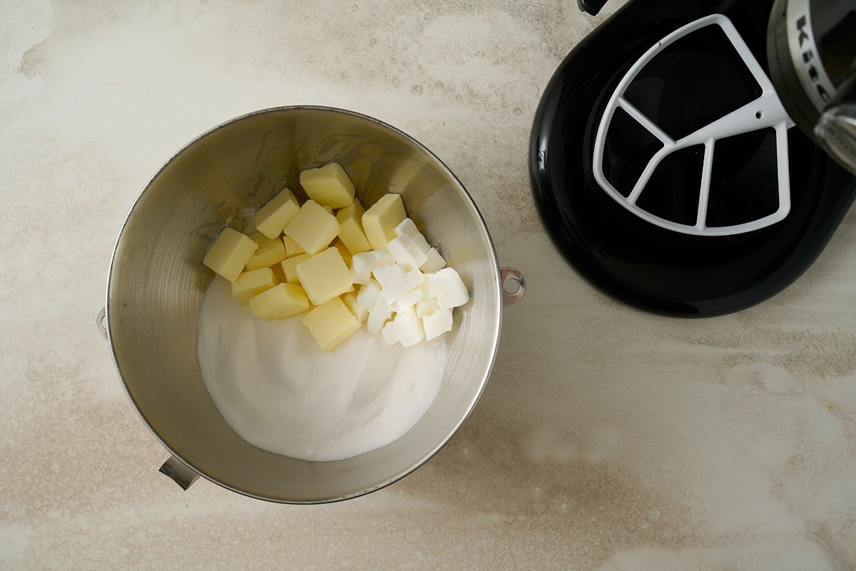 Overhead view of softened butter, shortening, and sugar together in a large bowl for the Taste of Home Lemon Pound Cake recipe.