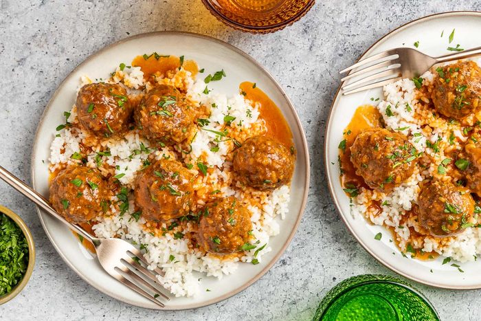 Taste Of Home Meatballs And Rice Photo Of The Finished Recipe Served On Plates.