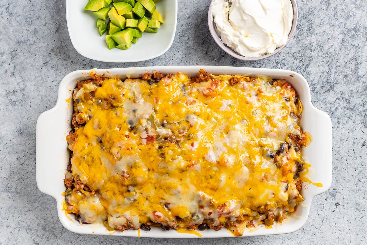 Taste of Home Nacho Casserole photo of the microwaved casserole with optional toppings.