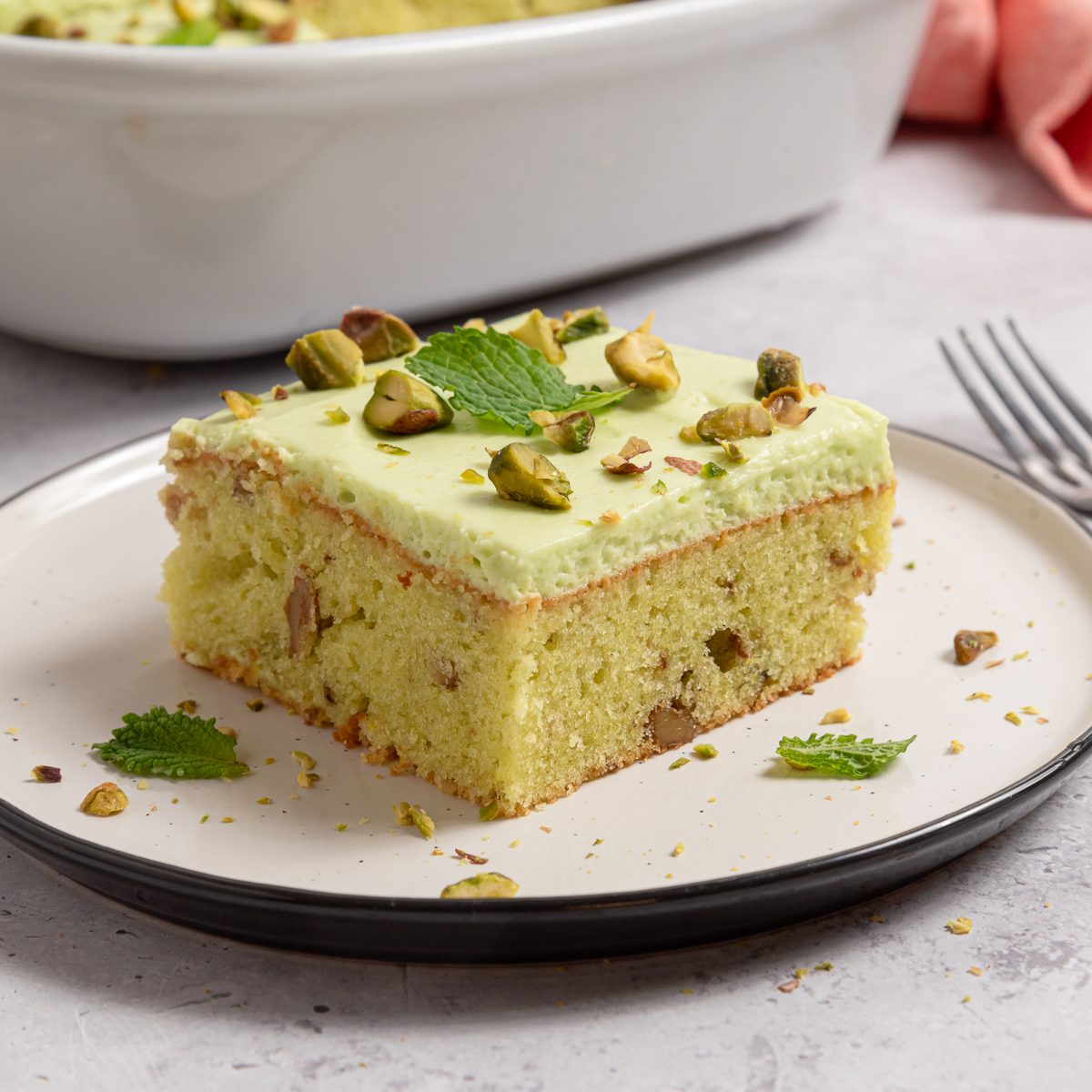 Slice Of Pistachio Cake On A Plate