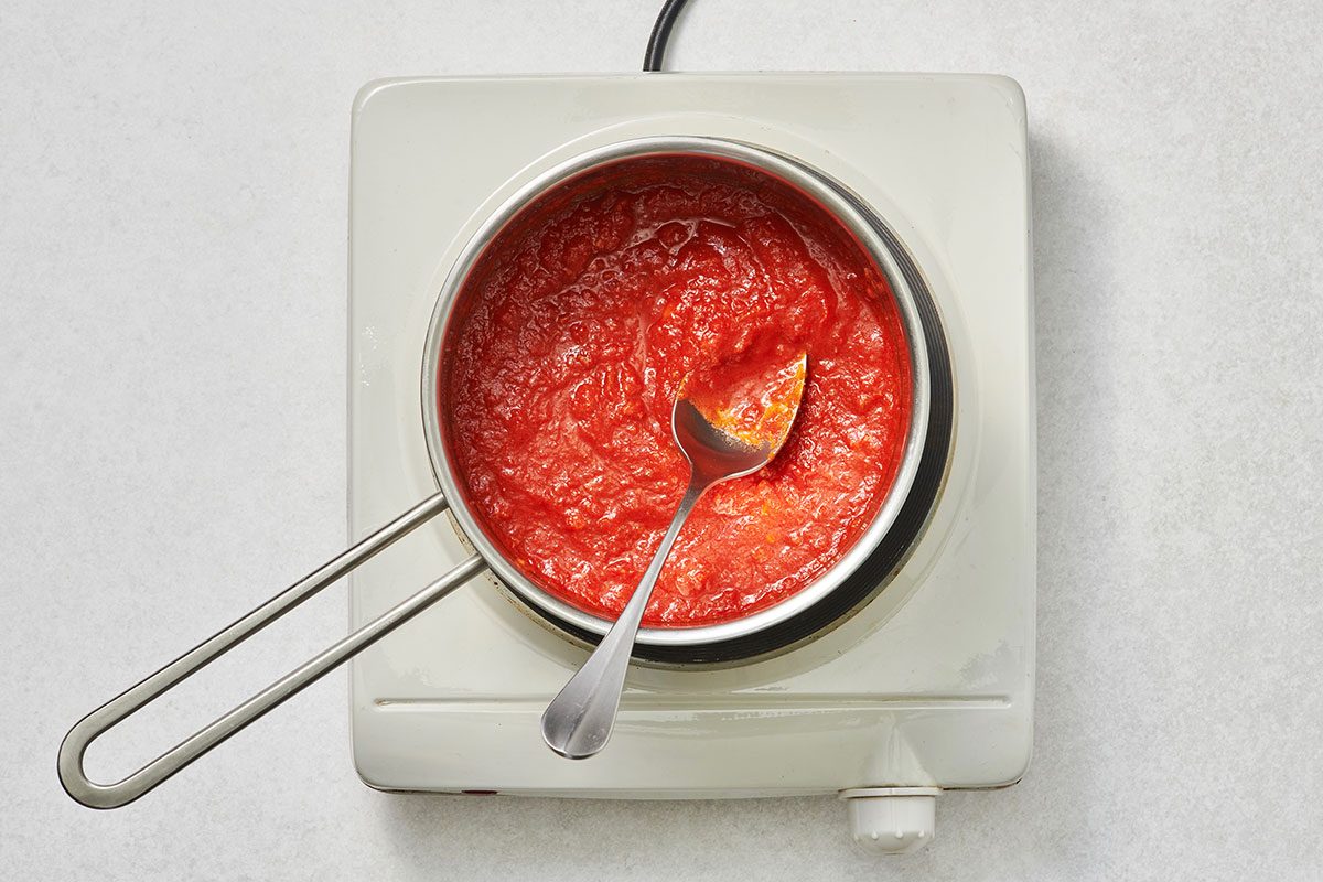 Spaghetti sauce warmed in a small saucepan