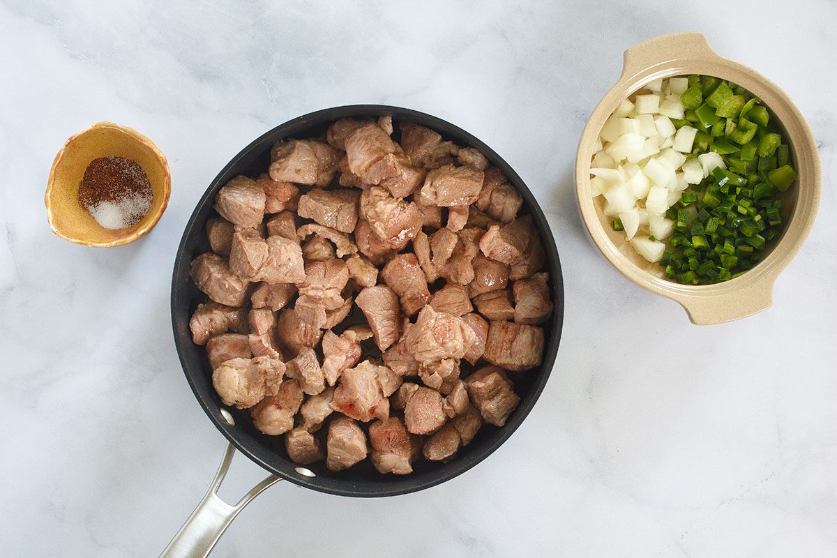 Browning pork in skillet