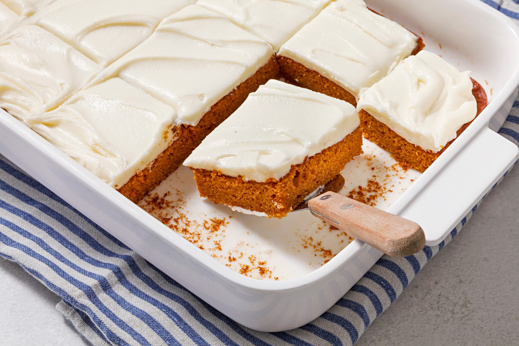 3/4th angle shot of Pumpkin Spice Cake with Cream Cheese Frosting.