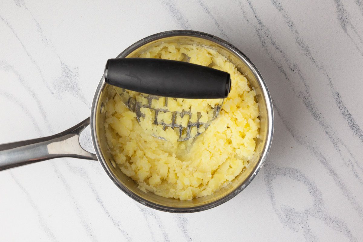 Step 1 of Taste of Home Savory Meat Pie is to make and mash the potatoes