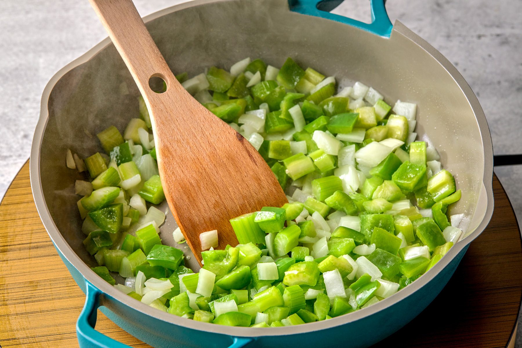 3/4th shot of a same skillet, heating remaining 2 tablespoons butter; Added onion, celery and bell pepper; cooking until tender, stirring occasionally