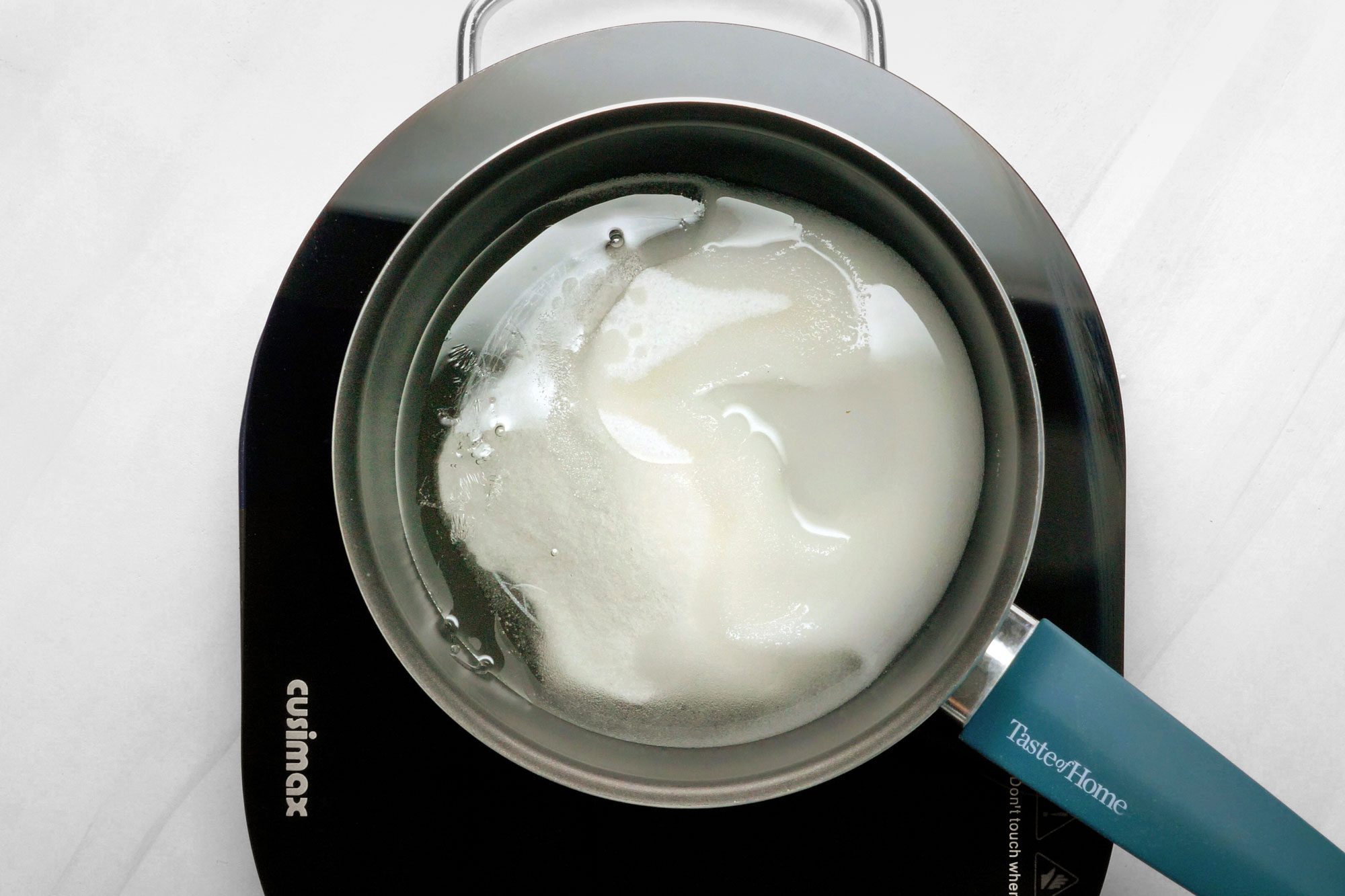 Make the cinnamon cream syrup by combining the sugar, corn syrup and water in a saucepan