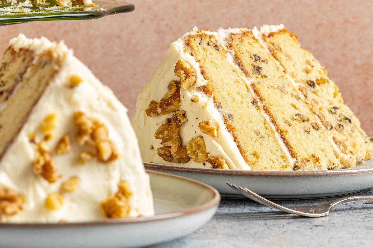 Taste of Home Walnut Cake photo of the final recipe cut into slices and served on plates.