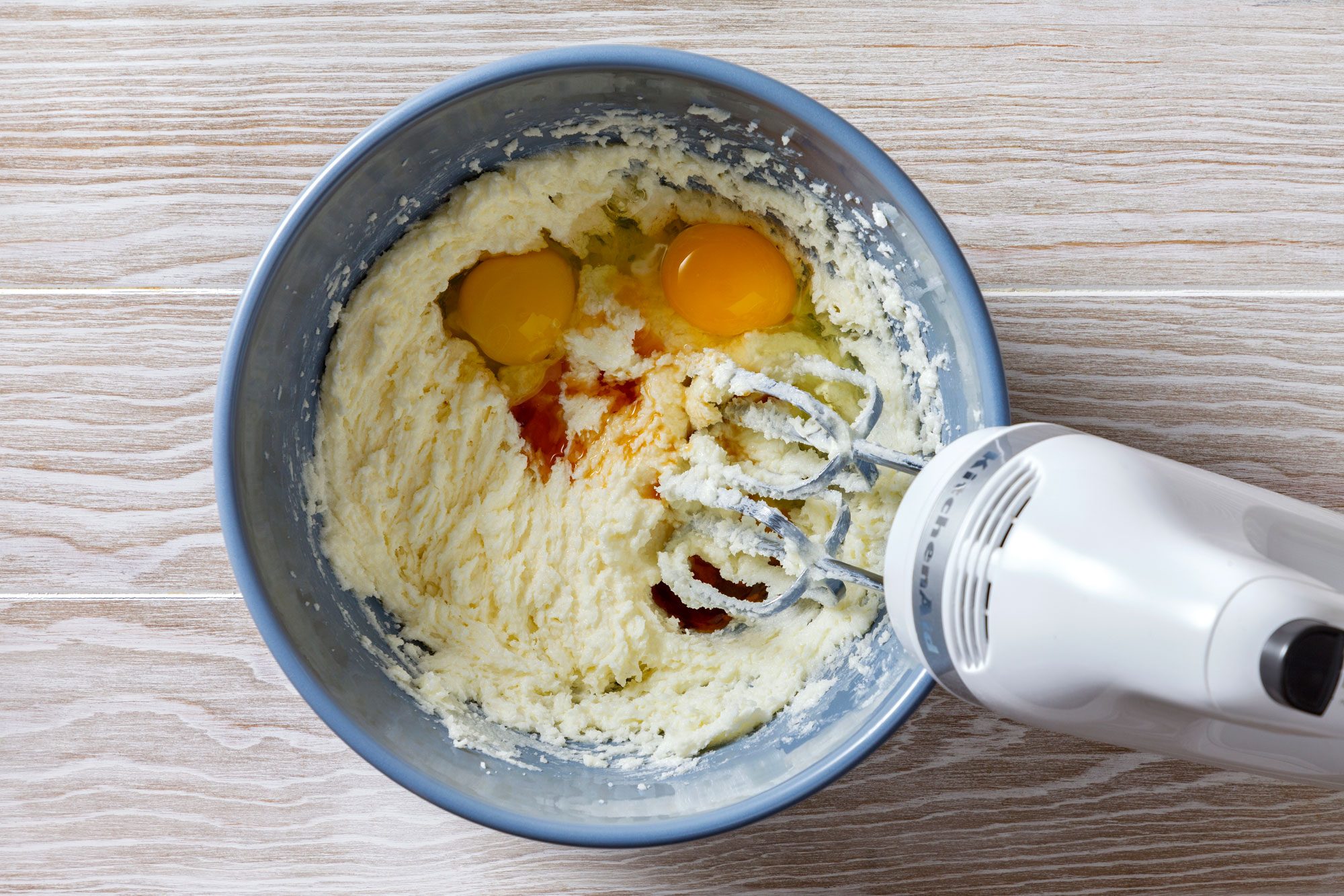 In a large bowl, cream butter and sugar until light and fluffy,