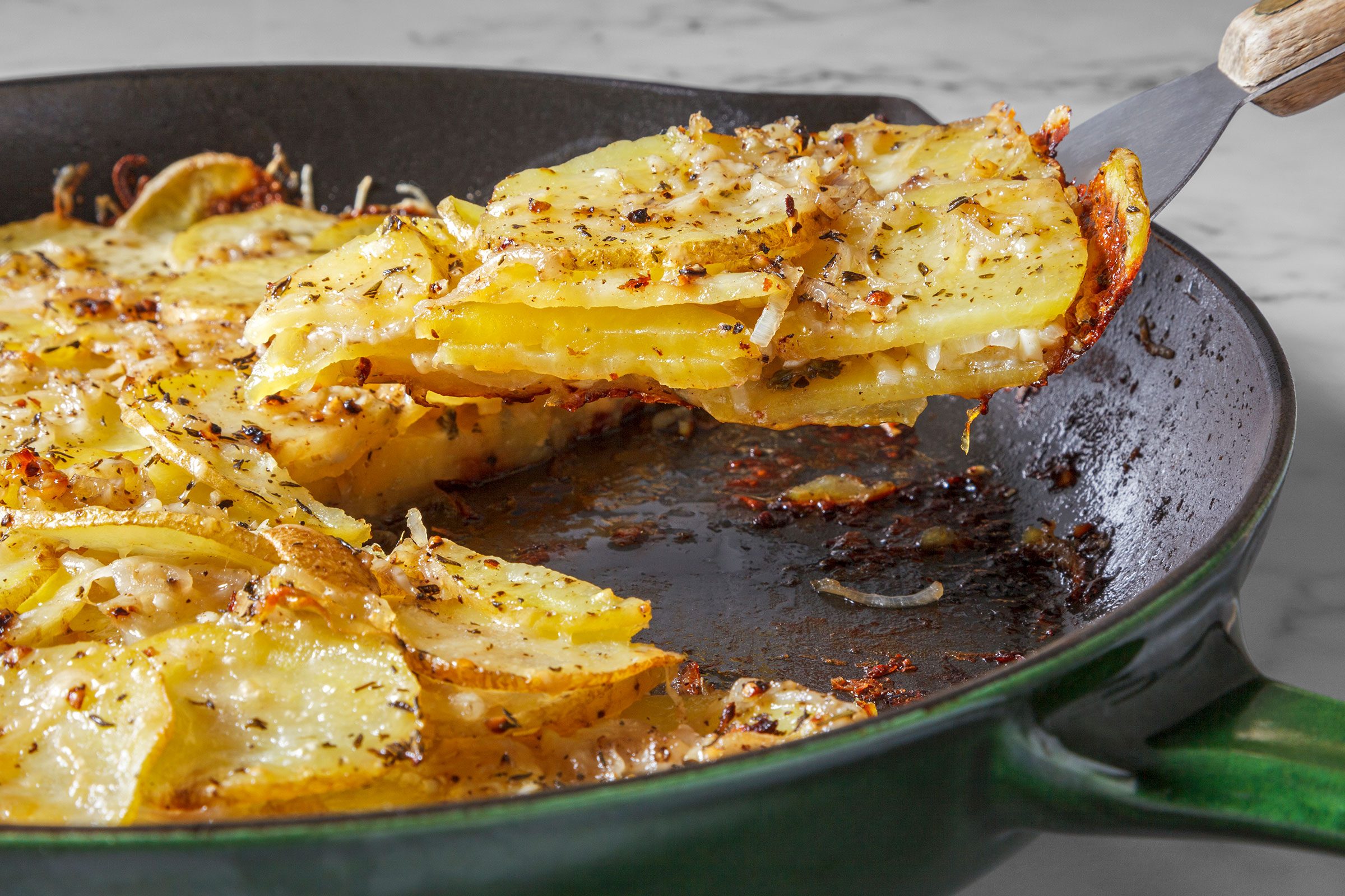 Potato Galette in a large skillet and sliced into wedges