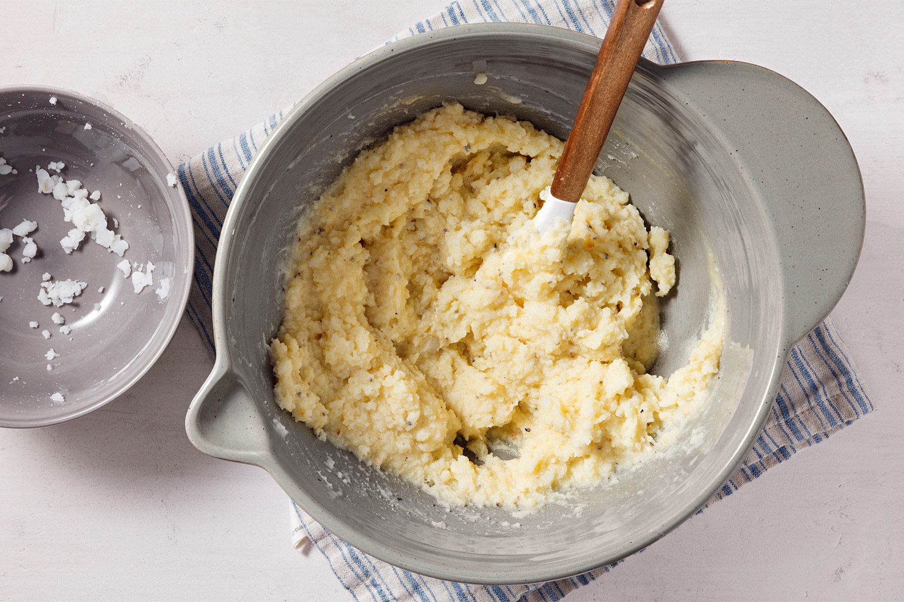 Add mashed potatoes; stir until thoroughly combined.