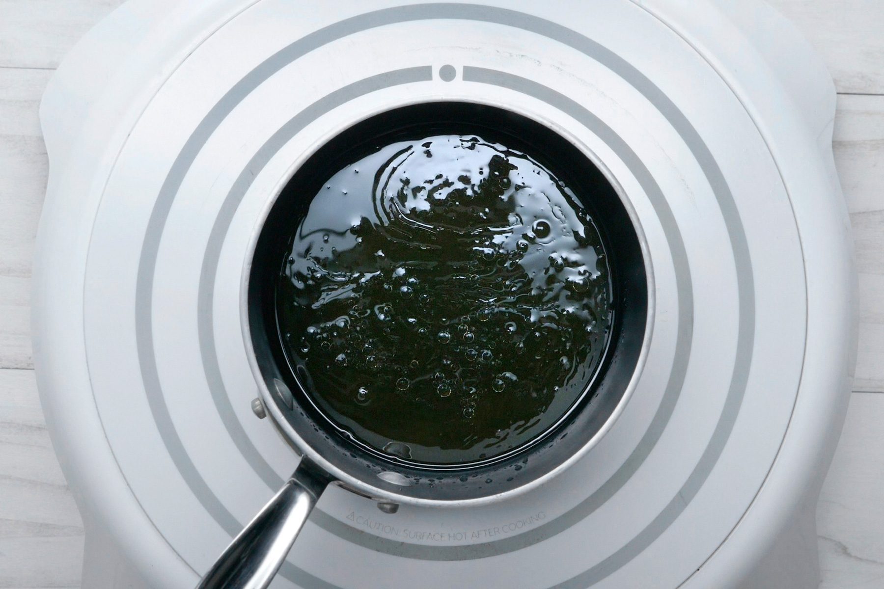 In a small saucepan, heat the water, honey and oil to 120° to 130°F. Add the wet ingredients to the dry ingredients, then beat on medium speed for two minutes. Add the egg and vanilla, and beat for two minutes longer