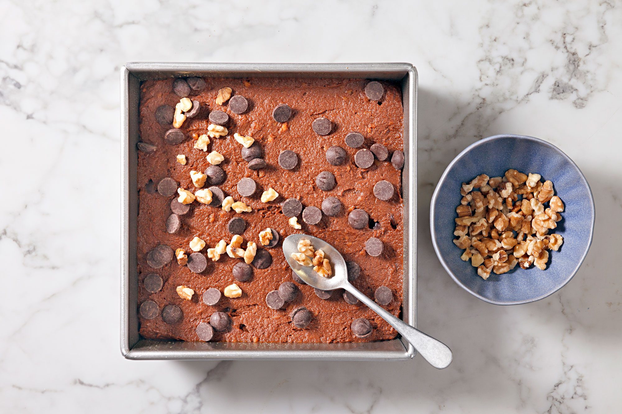 Sprinkle top with remaining chocolate chips and walnuts