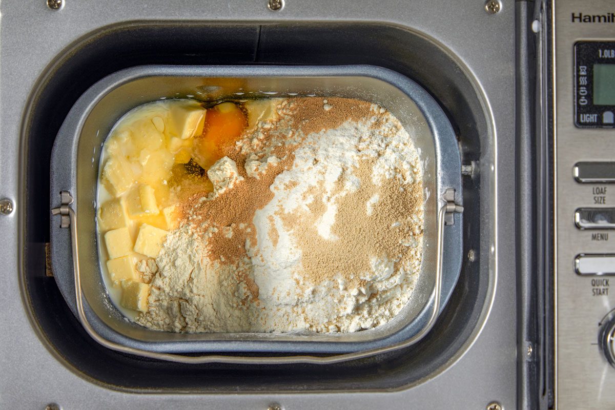 overhead shot of a bread maker with the ingredients for a loaf of bread inside
